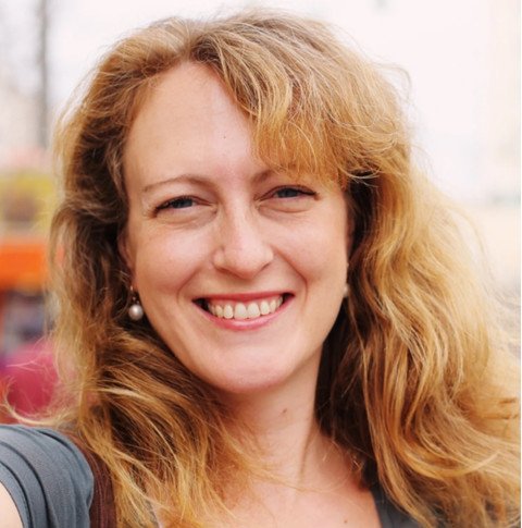 picture of shirley davis. old woman smiling and wearing with a white shirt